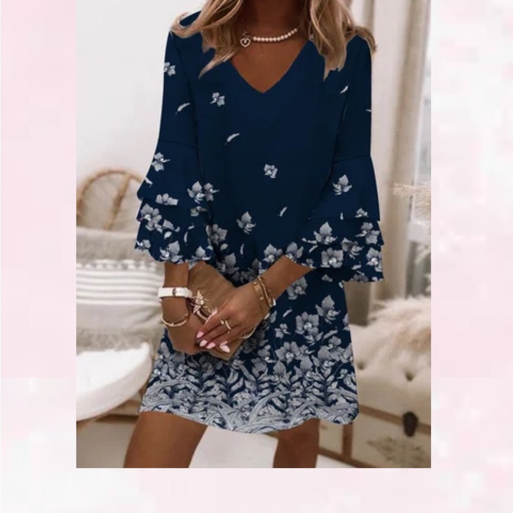 Nora Cora navy dress with white flowers. 3/4 sleeves.